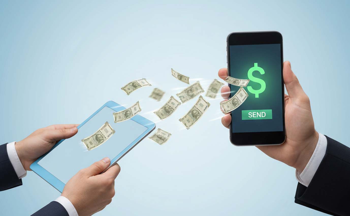 Digital transaction concept showing money being transferred between a tablet and smartphone, representing fast money transfer Oman to India.